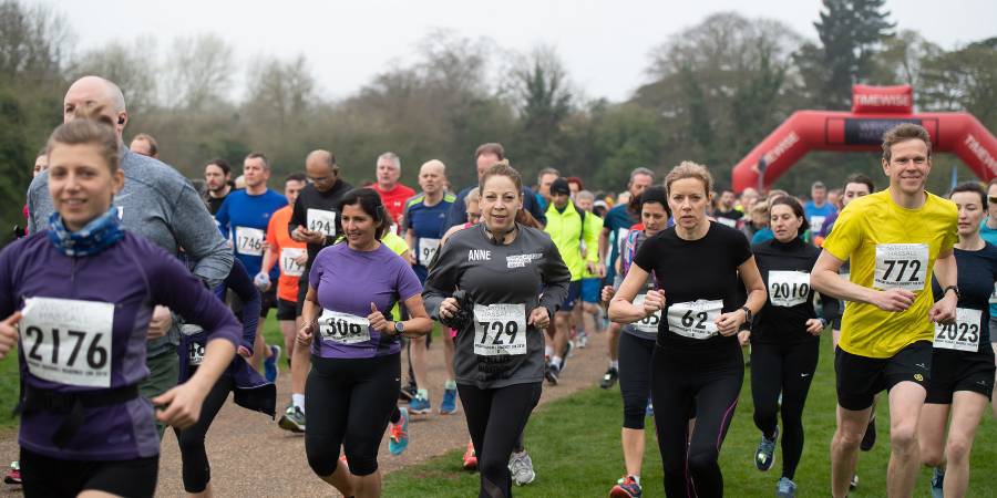 Crowd of runners competing in the Susan Peterson LLP Regency run