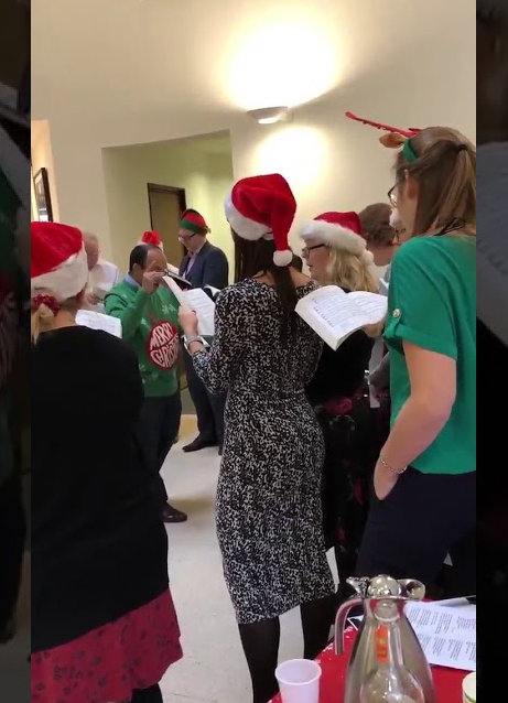 Susan Peterson LLP choristers singing at Christmas